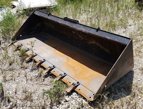 cat skid steer bucket blade|standard skid steer bucket size.